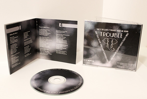 Digipak designed for Cage The Elephant featuring a die cut created using Adobe &copy; Indesign, and Adobe &copy; Illustrator